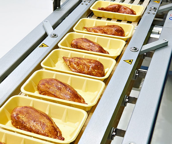 Foam trays on production machine