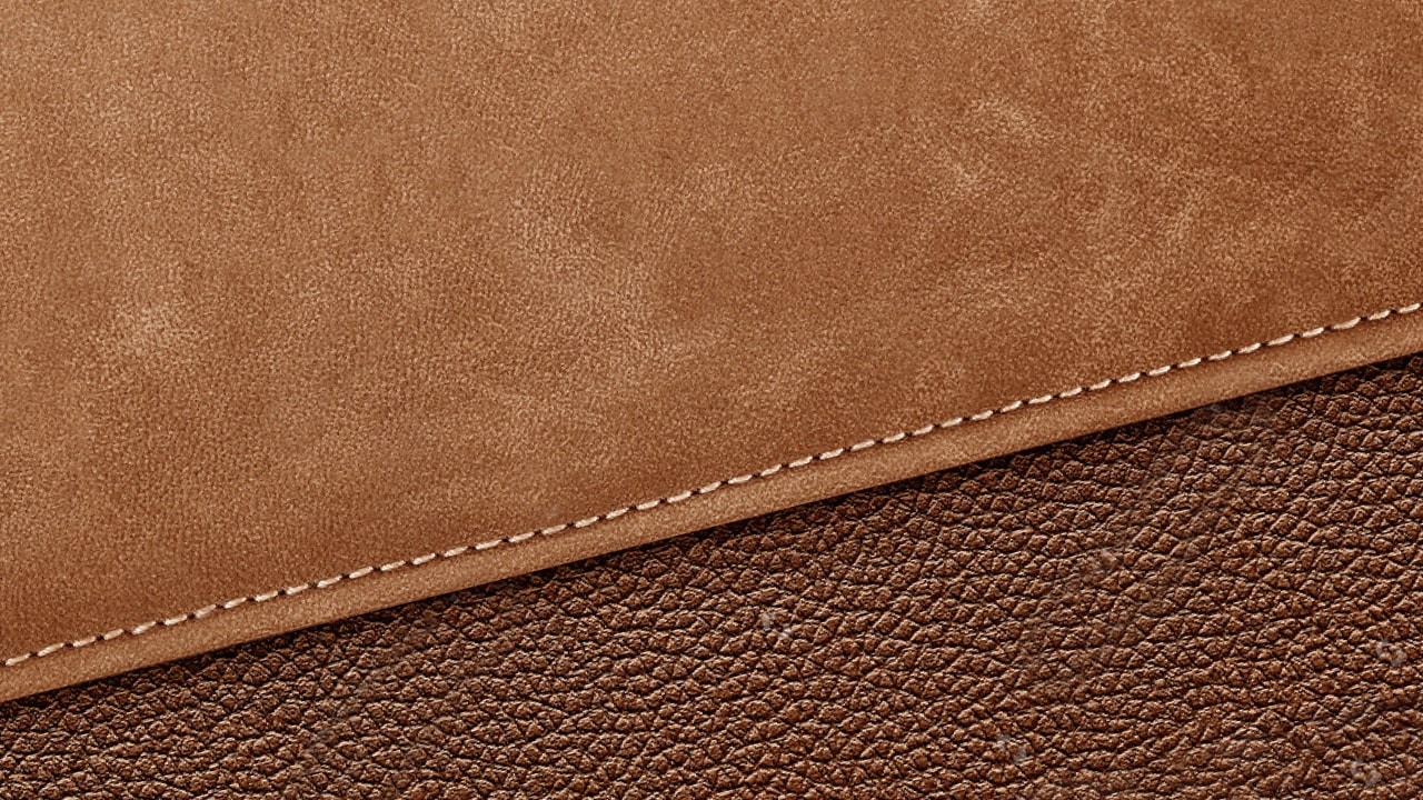 Smooth and textured leather stitched together